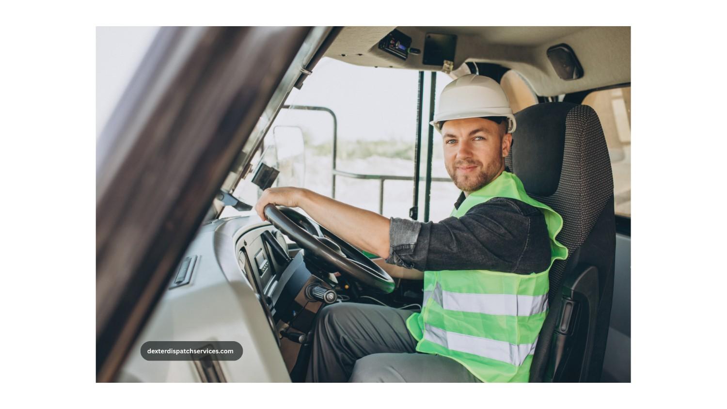 A man driving a truck on the road